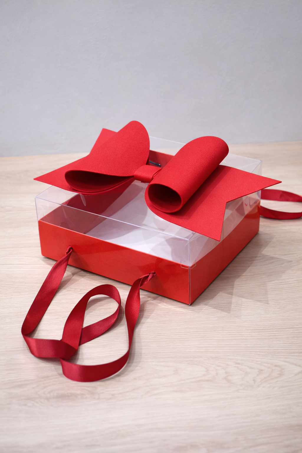 Luxury Red Transparent Gift Hamper Box with Bow & Ribbon Handle | Sqaure Red Bow Box 21 × 21 × 10 cms