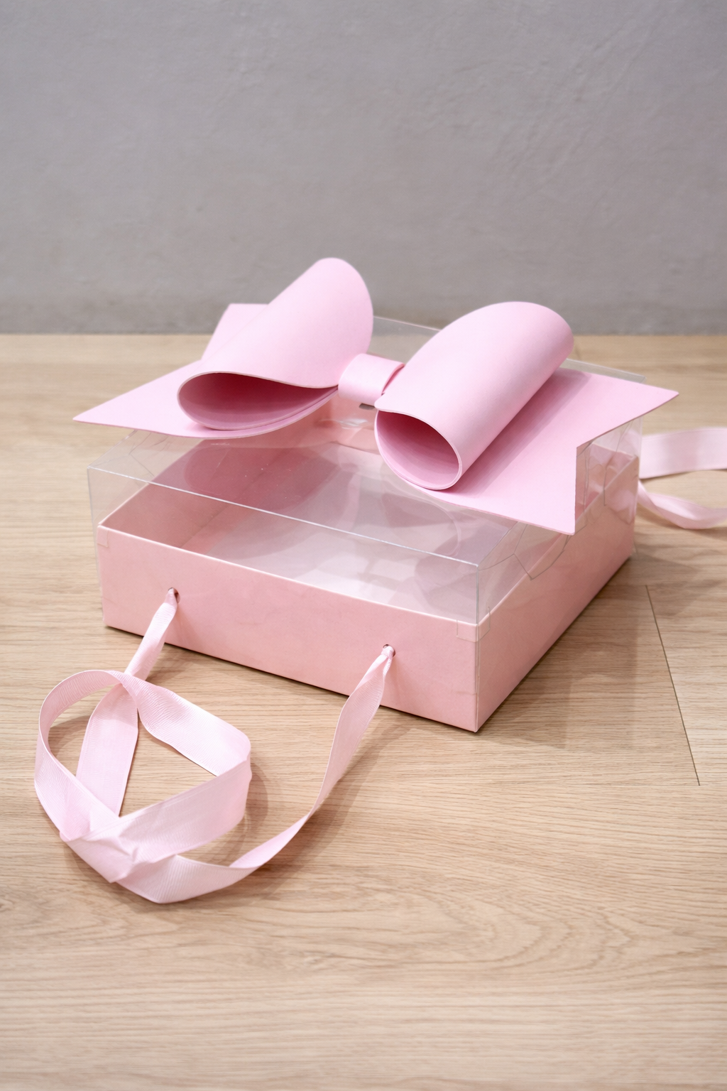 Luxury Pink Transparent Gift Hamper Box with Bow & Ribbon Handle | Sqaure Pink Bow Box 21 × 21 × 10 cms